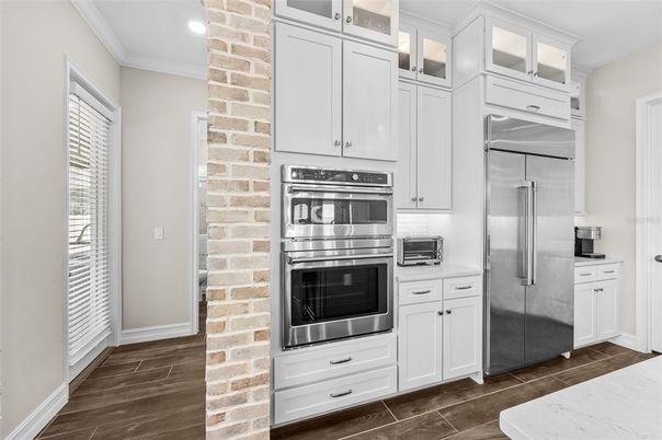Interior, Kitchen, Recessed Lighting, Stainless Steel Appliances, Stone Walls, Wood Texture Flooring