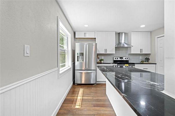 Interior, Kitchen, Recessed Lighting, Stainless Steel Appliances, Wood Texture Flooring