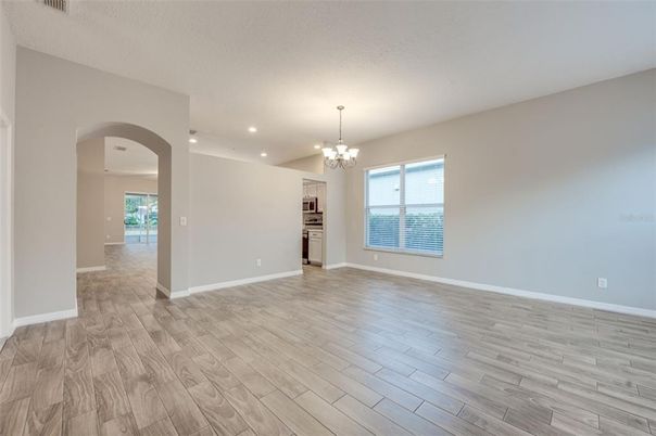 Chandelier, Empty room, Interior, Recessed Lighting, Wood Texture Flooring