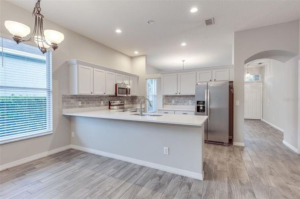 Interior, Kitchen, Pendant Lights, Recessed Lighting, Stainless Steel Appliances, Wood Texture Flooring