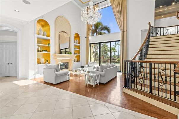 Chandelier, Fireplace, Interior, Living room, Recessed Lighting, Wood Texture Flooring