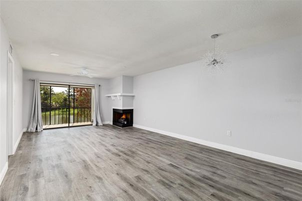 Empty room, Fireplace, Interior, Pendant Lights, Wood Texture Flooring
