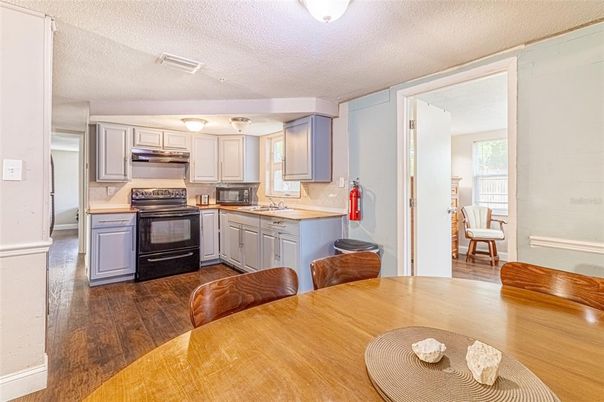 Dining room, Interior, Kitchen, Stainless Steel Appliances, Wood Texture Flooring
