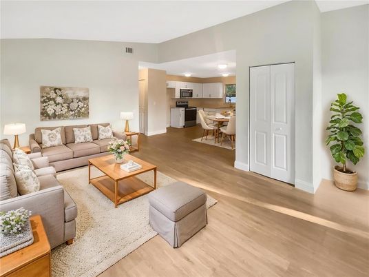 Dining room, Interior, Kitchen, Living room, Recessed Lighting, Stainless Steel Appliances, Wood Texture Flooring