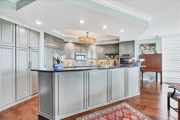 Chandelier, Interior, Kitchen, Recessed Lighting, Stainless Steel Appliances, Wood Texture Flooring