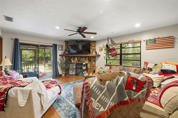 Fireplace, Interior, Living room, Recessed Lighting, Wood Texture Flooring