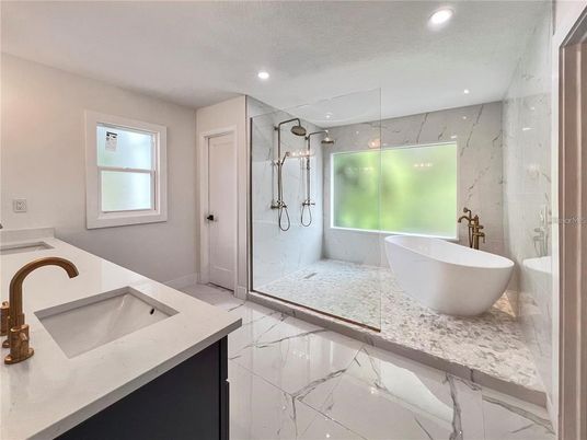 Bathroom, Dual Sink Vanities, Free Standing Baths, Glass Shower, Interior, Marble, Marble Walls, Recessed Lighting