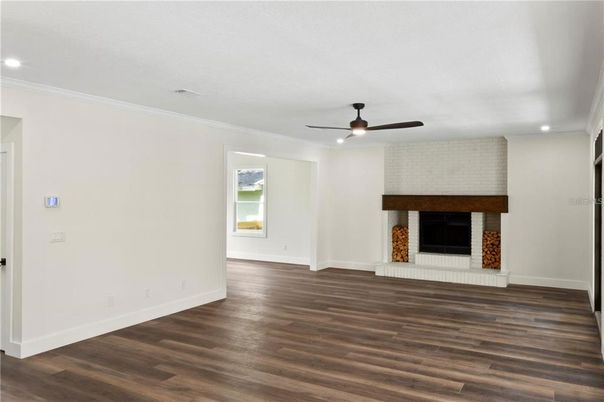 Empty room, Fireplace, Interior, Recessed Lighting, Wood Texture Flooring