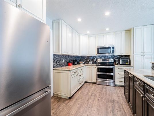 Interior, Kitchen, Recessed Lighting, Stainless Steel Appliances, Wood Texture Flooring
