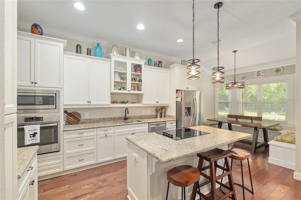 Interior, Kitchen, Pendant Lights, Recessed Lighting, Stainless Steel Appliances, Wood Texture Flooring