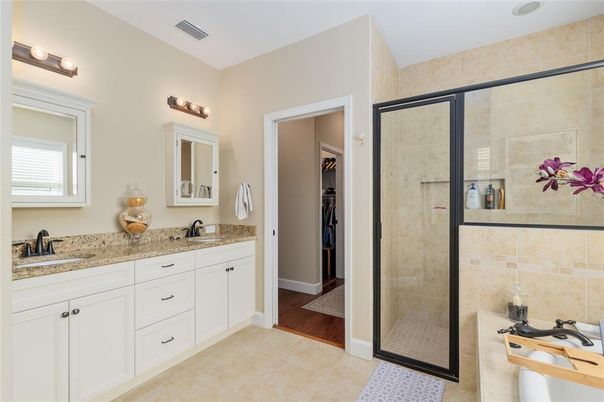 Bathroom, Dual Sink Vanities, Glass Shower, Interior, Wood Texture Flooring