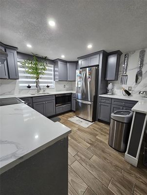 Interior, Kitchen, Recessed Lighting, Stainless Steel Appliances, Wood Texture Flooring