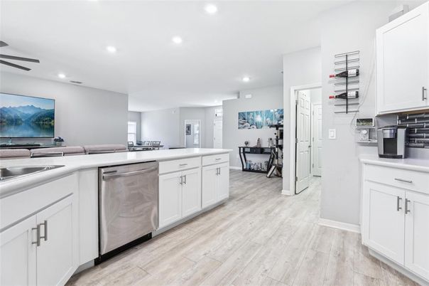 Dining room, Interior, Kitchen, Recessed Lighting, Stainless Steel Appliances, Wood Texture Flooring
