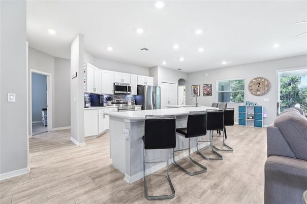 Interior, Kitchen, Recessed Lighting, Stainless Steel Appliances, Wood Texture Flooring