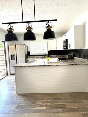 Interior, Kitchen, Pendant Lights, Stainless Steel Appliances, Wood Texture Flooring