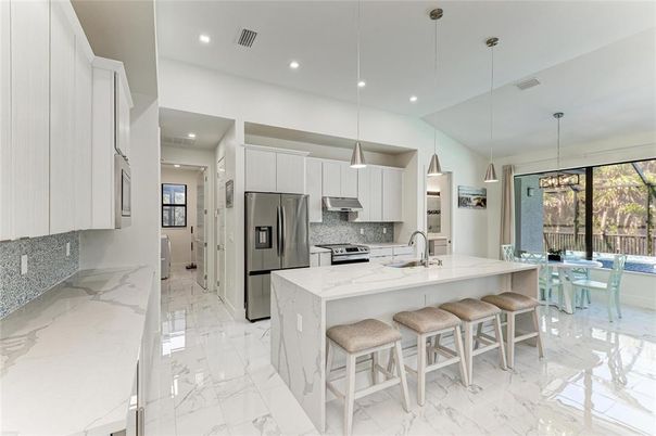 Interior, Kitchen, Marble, Pendant Lights, Recessed Lighting, Stainless Steel Appliances