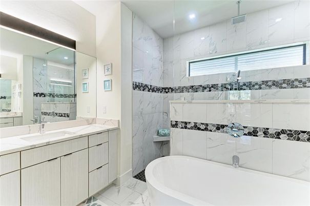 Bathroom, Dual Sink Vanities, Interior, Marble, Marble Walls, Recessed Lighting