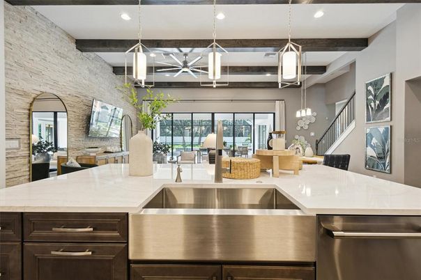 Interior, Kitchen, Pendant Lights, Recessed Lighting, Stainless Steel Appliances, Stone Walls, Wooden Beams