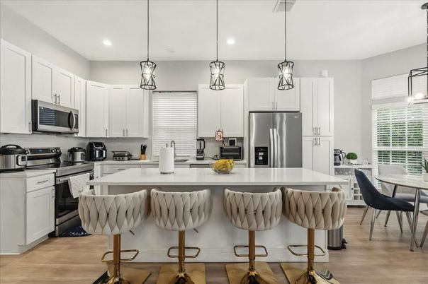 Interior, Kitchen, Pendant Lights, Recessed Lighting, Stainless Steel Appliances, Wood Texture Flooring