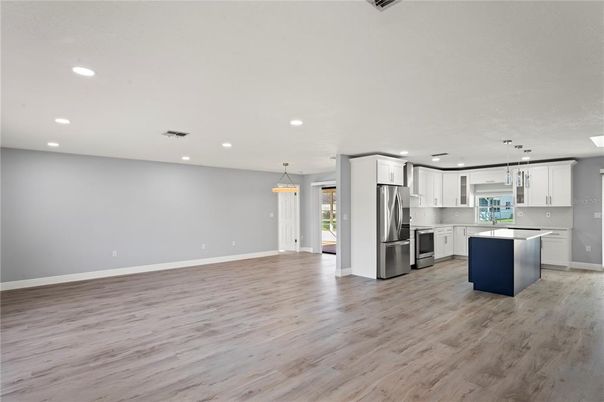 Interior, Kitchen, Pendant Lights, Recessed Lighting, Stainless Steel Appliances, Wood Texture Flooring