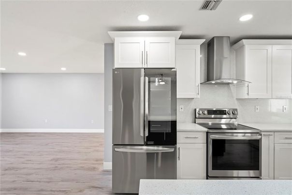 Interior, Kitchen, Recessed Lighting, Stainless Steel Appliances, Wood Texture Flooring
