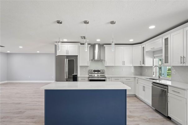 Interior, Kitchen, Pendant Lights, Recessed Lighting, Stainless Steel Appliances, Wood Texture Flooring