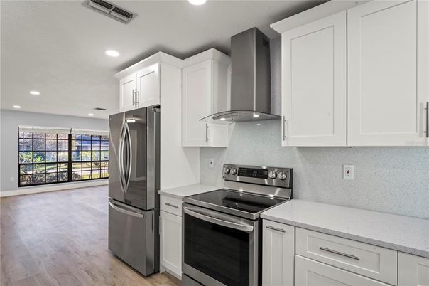 Interior, Kitchen, Recessed Lighting, Stainless Steel Appliances, Wood Texture Flooring