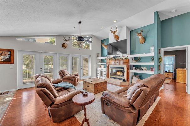 Fireplace, Interior, Living room, Recessed Lighting, Wood Texture Flooring