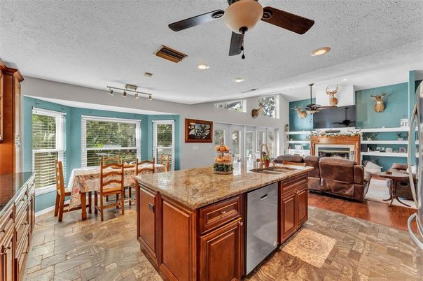 Dining room, Fireplace, Interior, Kitchen, Living room, Recessed Lighting, Wood Texture Flooring