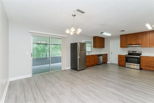 Chandelier, Interior, Kitchen, Pendant Lights, Stainless Steel Appliances, Wood Texture Flooring