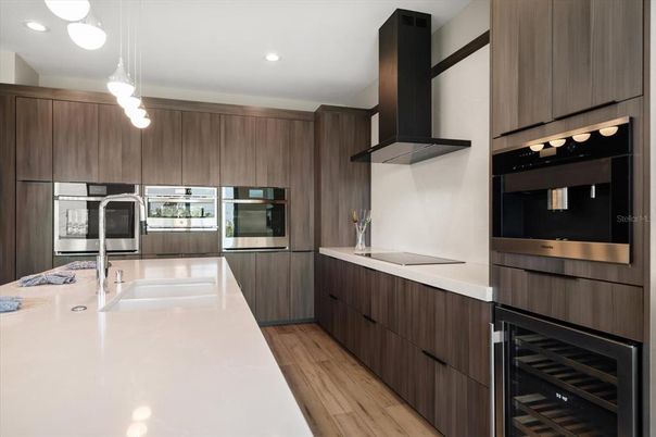 Interior, Kitchen, Pendant Lights, Recessed Lighting, Stainless Steel Appliances, Wood Texture Flooring
