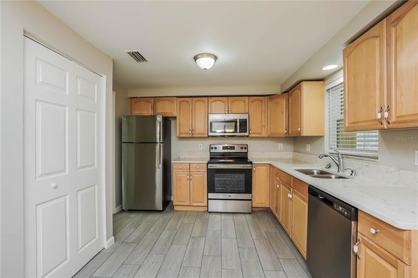 Interior, Kitchen, Recessed Lighting, Stainless Steel Appliances, Wood Texture Flooring