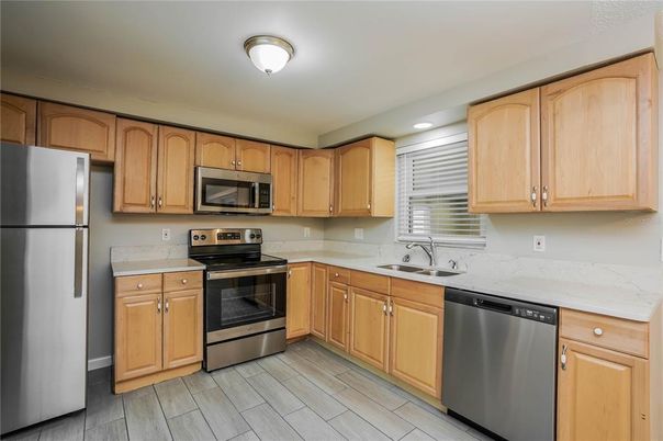 Interior, Kitchen, Recessed Lighting, Stainless Steel Appliances, Wood Texture Flooring