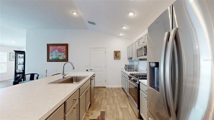 Interior, Kitchen, Recessed Lighting, Stainless Steel Appliances, Wood Texture Flooring