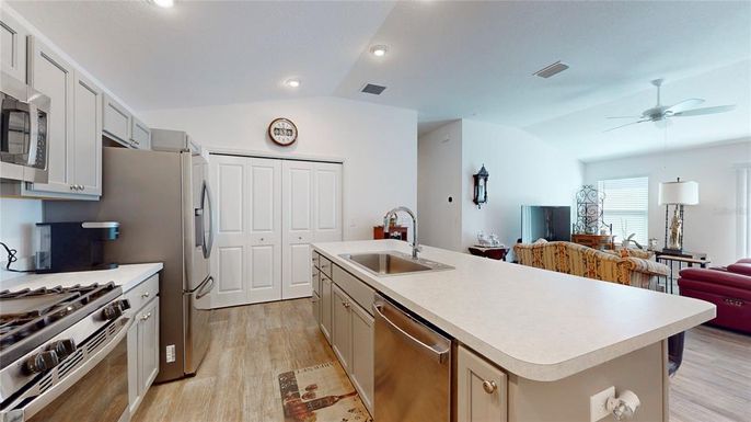 Dining room, Interior, Kitchen, Recessed Lighting, Stainless Steel Appliances, Wood Texture Flooring