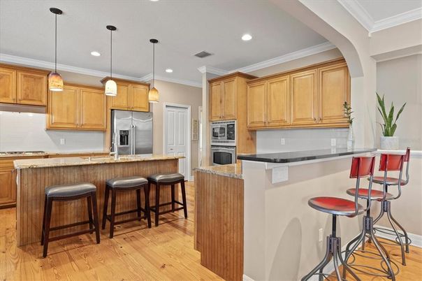 Interior, Kitchen, Pendant Lights, Recessed Lighting, Stainless Steel Appliances, Wood Texture Flooring