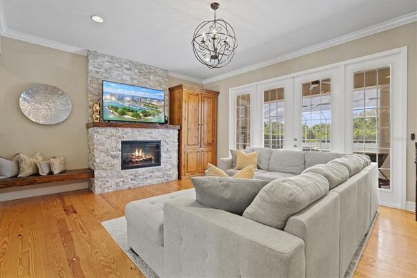 Fireplace, Interior, Living room, Recessed Lighting, Stone Walls, Wood Texture Flooring