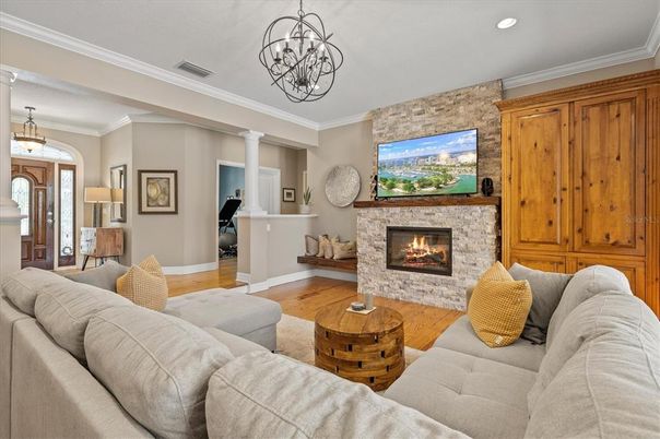 Fireplace, Interior, Living room, Pendant Lights, Recessed Lighting, Stone Walls, Wood Texture Flooring