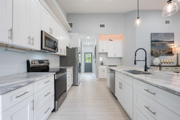 Interior, Kitchen, Pendant Lights, Recessed Lighting, Stainless Steel Appliances, Wood Texture Flooring