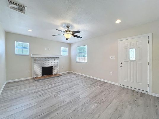 Empty room, Fireplace, Interior, Recessed Lighting, Wood Texture Flooring