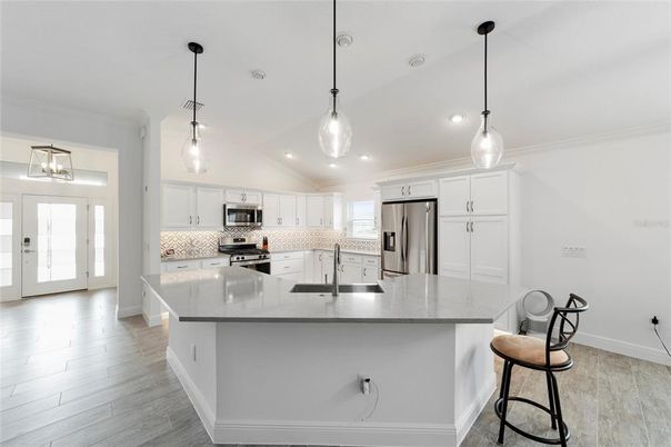 Interior, Kitchen, Pendant Lights, Recessed Lighting, Stainless Steel Appliances, Wood Texture Flooring