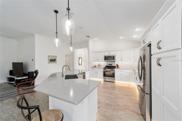 Interior, Kitchen, Pendant Lights, Recessed Lighting, Stainless Steel Appliances, Wood Texture Flooring