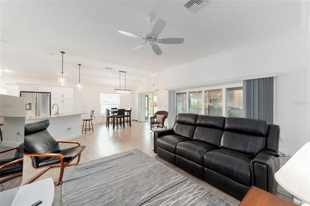 Dining room, Interior, Kitchen, Living room, Pendant Lights, Stainless Steel Appliances, Wood Texture Flooring