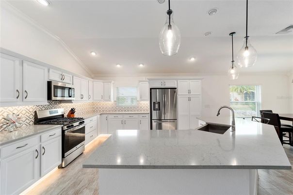 Interior, Kitchen, Pendant Lights, Recessed Lighting, Stainless Steel Appliances, Wood Texture Flooring