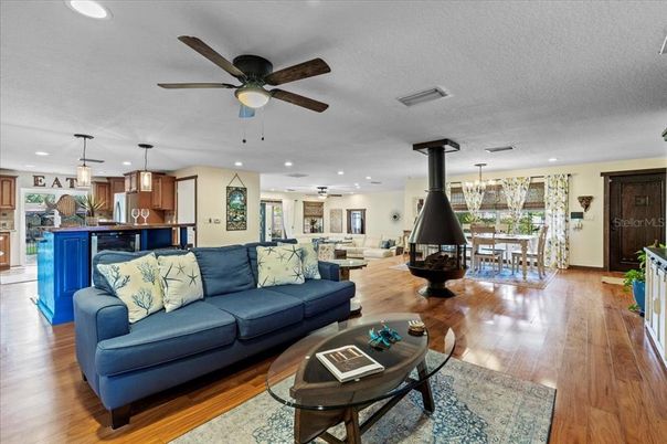 Chandelier, Dining room, Interior, Kitchen, Living room, Pendant Lights, Recessed Lighting, Wood Texture Flooring