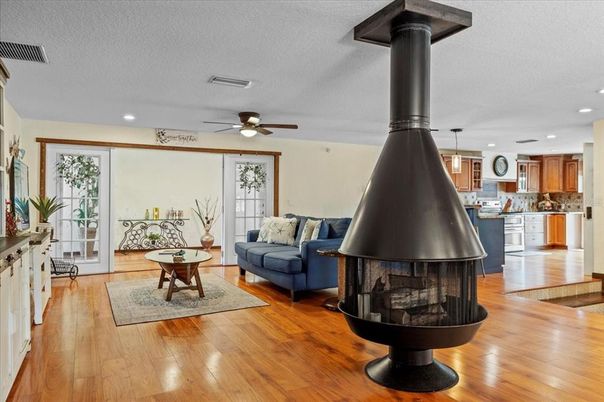 Fireplace, Interior, Kitchen, Recessed Lighting, Wood Texture Flooring