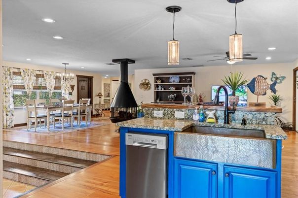 Chandelier, Dining room, Fireplace, Interior, Kitchen, Pendant Lights, Recessed Lighting, Wood Texture Flooring