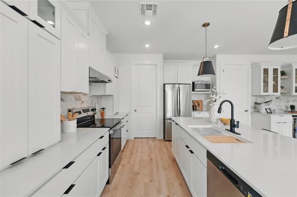 Interior, Kitchen, Pendant Lights, Recessed Lighting, Stainless Steel Appliances, Wood Texture Flooring