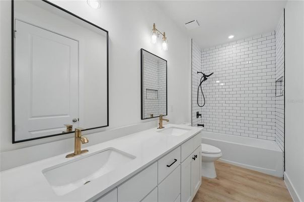 Bathroom, Dual Sink Vanities, Interior, Recessed Lighting, Wood Texture Flooring