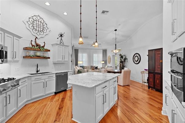 Dining room, Interior, Kitchen, Pendant Lights, Recessed Lighting, Stainless Steel Appliances, Wood Texture Flooring